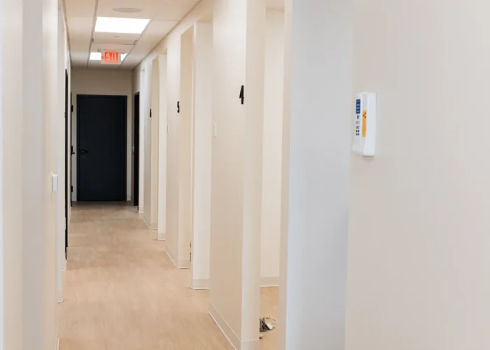 Hallway inside Scioto Smile Studio featuring clean design and calming lighting